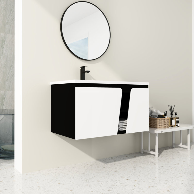 Meuble-lavabo moderne avec lavabo en céramique et porte d'armoire à fermeture en douceur. . Rangement adéquat. Fabrication en contreplaqué. Lavabo blanc et noir de 36 po pour salle de bain. Blanc spacieux et noir