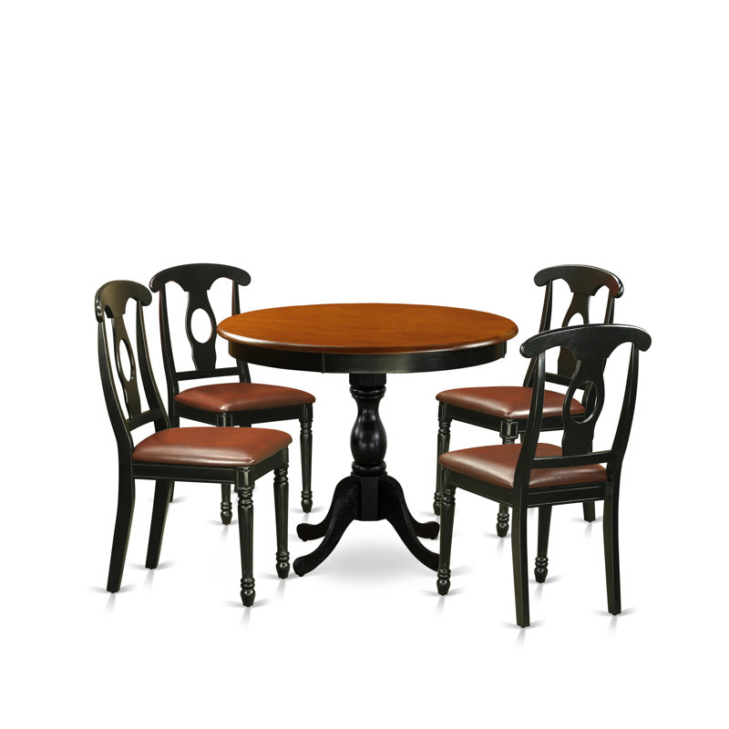 L'ensemble de salle à manger 5 pièces comprend une table de salle à manger et 4 chaises de cuisine en similicuir avec dossier Napoléon - finition noire
