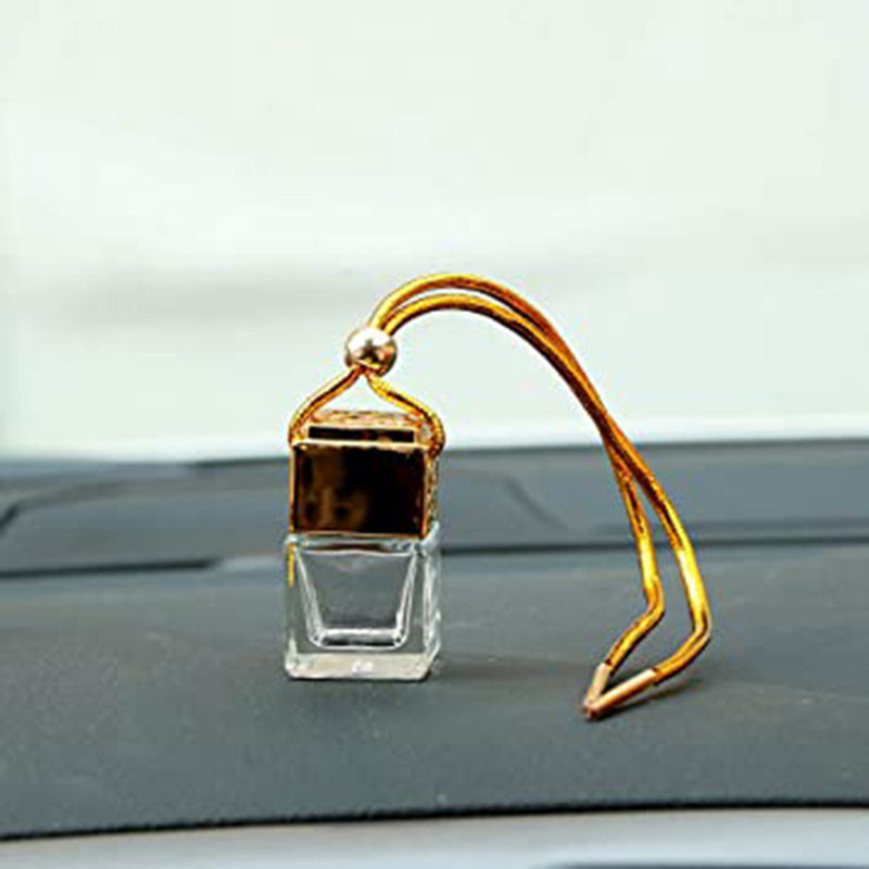 Luminaire suspendu pour bouteille de parfum