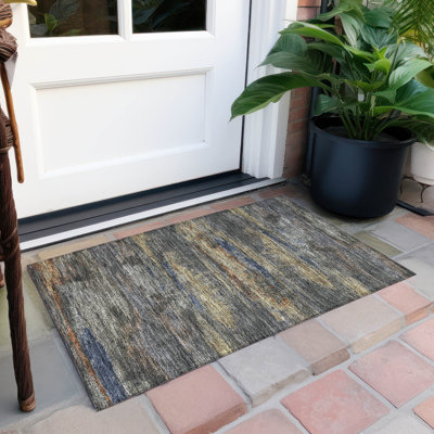 Tapis rectangulaire Aleighna avec envers antidérapant