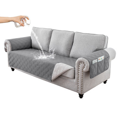 Housse pour canapé 3 places avec accoudoirs matelassés et imperméables avec poche latérale