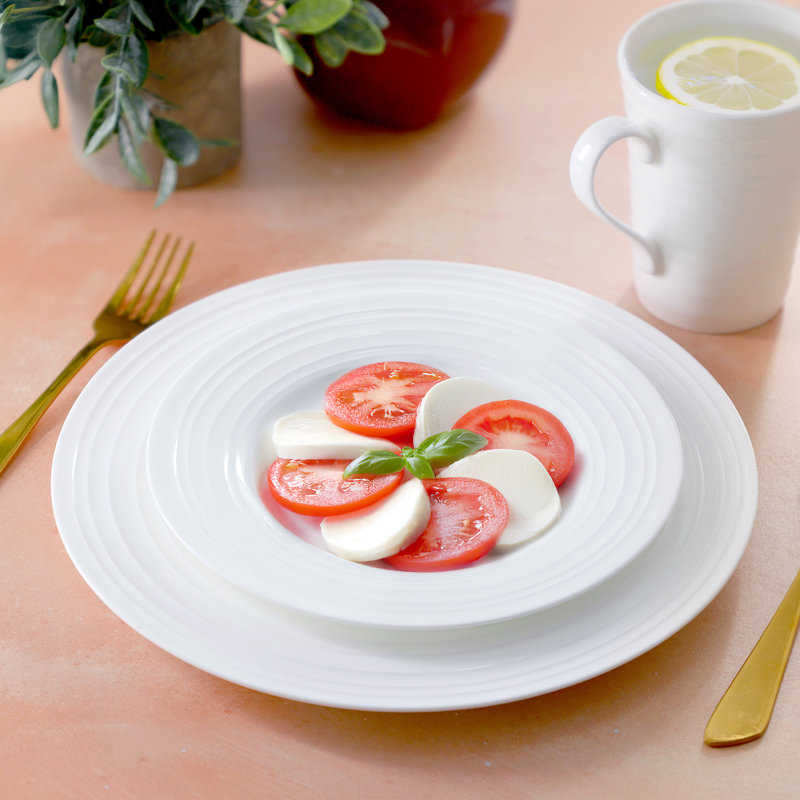 Gibson 16 Piece Embossed Bone China Dinnerware Set in White