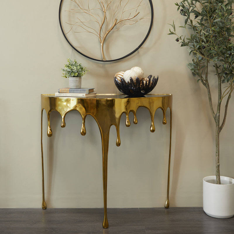 Moderna Aluminum Metal Abstract Crescent Drip Living Room Console Table with Melting Designed Legs and Shaded Glass Top, Gold