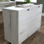 Bureau en L avec tablettes ouvertes réglables