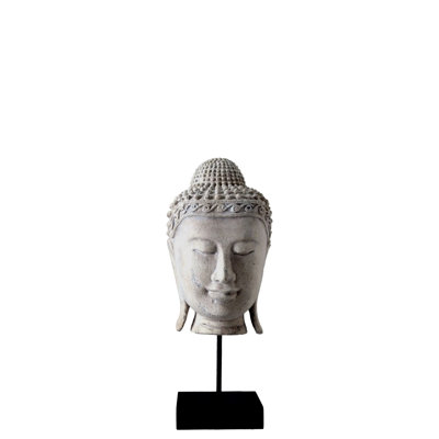 Statue de tête de bouddha antique sur pied