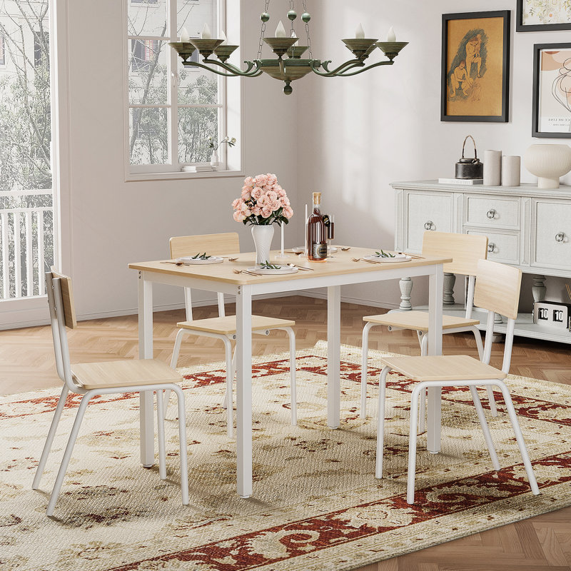 Ensemble de table de salle à manger élégant de 5 pièces avec 4 chaises, parfait pour créer une atmosphère de salle à manger harmonieuse dans n'importe quelle maison