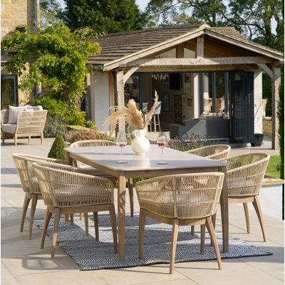 Geraldo 6 - Person Acacia Patio Dining Set with Rectangular Table , Cushions Included