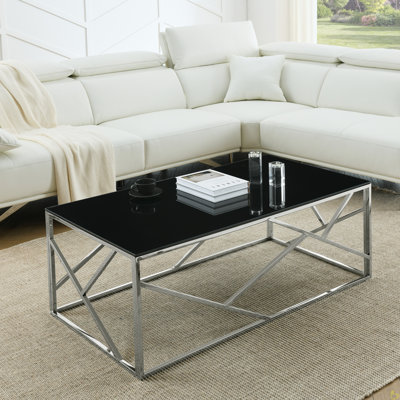 Table basse rectangulaire avec plateau en verre trempé et structure en acier inoxydable