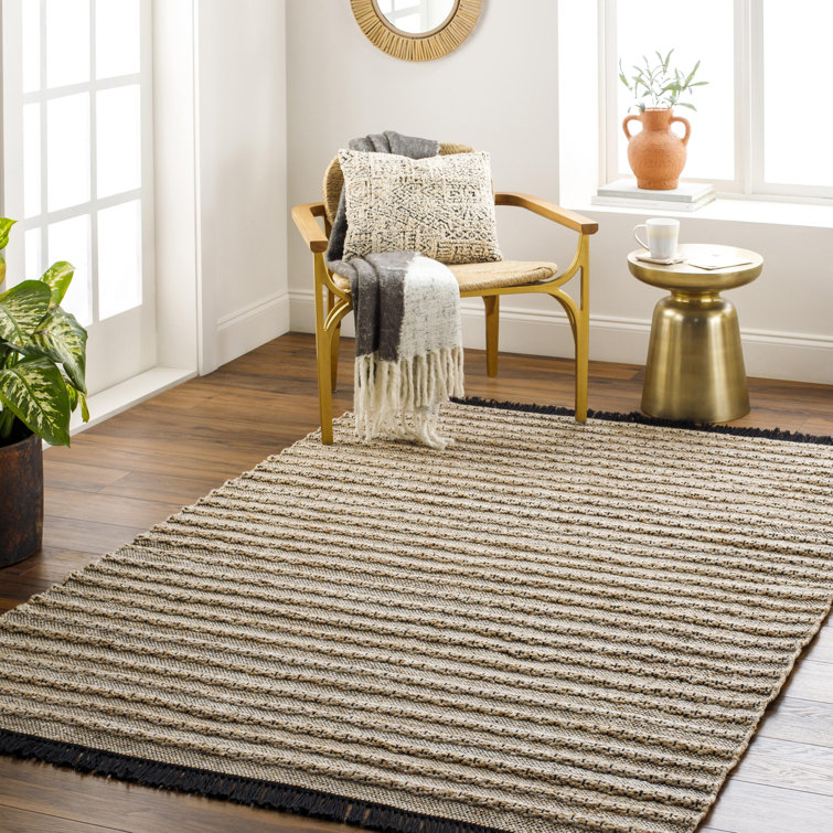 Crumrine Solid Color Handmade Flatweave Polyester Area Rug in Brown