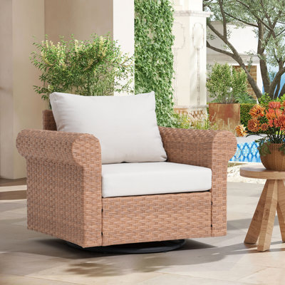 Chaise d'extérieur pivotante en rotin avec coussins