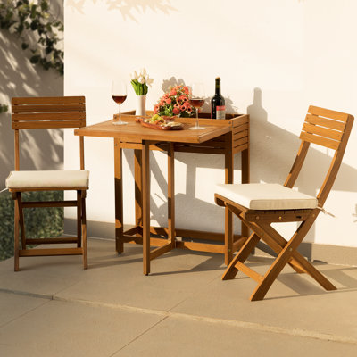 2 - Person Solid Wood Patio Dining Set Extendable Rectangular Table with Cushions Included