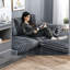 Canapé modulaire en chenille gris avec repose-pieds