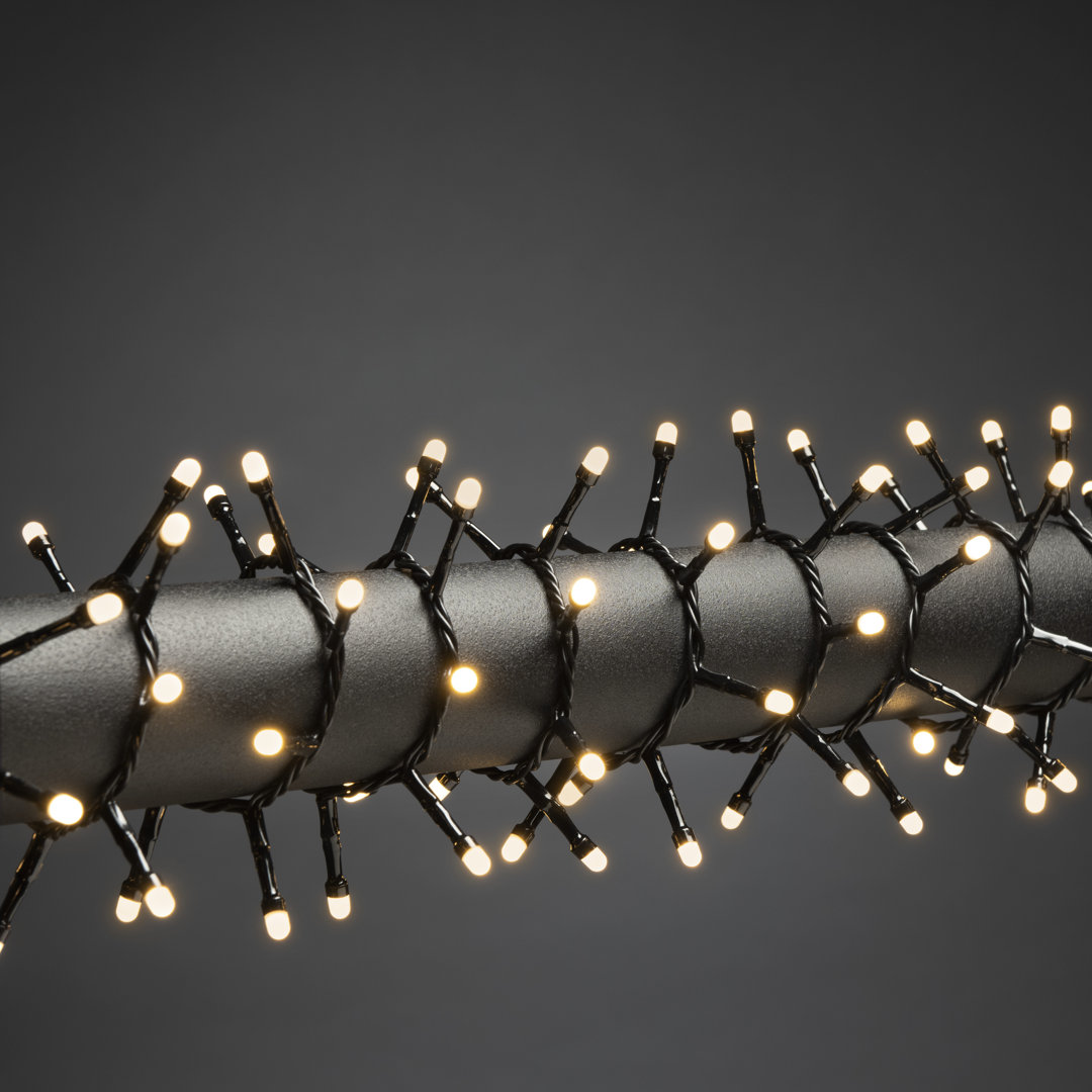 Outdoor or Indoor Cluster Light Set - 600 Warm White Frosted LEDs, Black Cable, 1318cm Lit Length