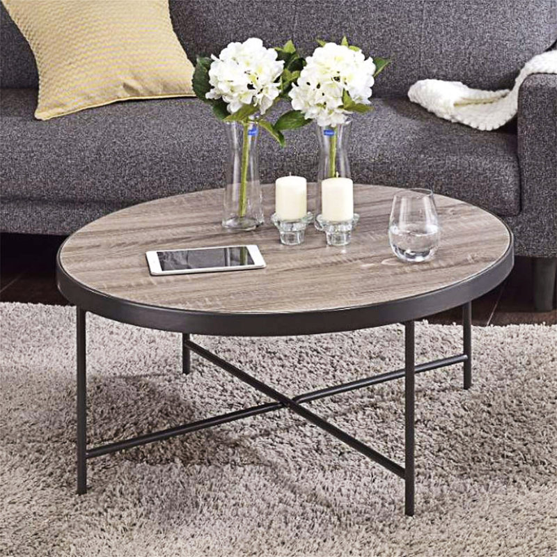 Table basse ronde en bois avec cadre en métal