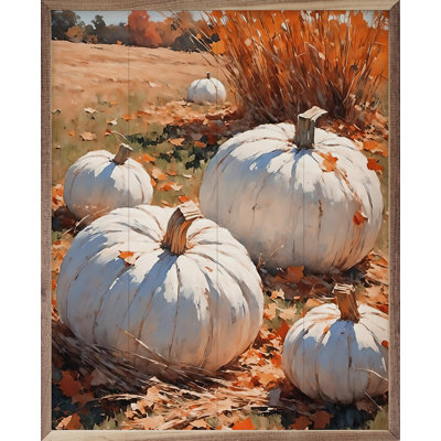 «White Pumpkins On Leaves In Field» sur