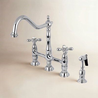 Kingston Brass Heritage Two-Handle 4-Hole Deck Mount Bridge Kitchen Faucet with Brass Side Sprayer