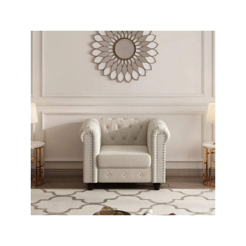 Fauteuil Chesterfield capitonné