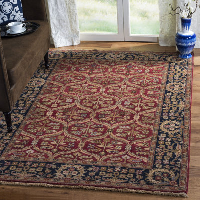 Tapis oriental 100 po en laine rouge / bleu marine / brun Belfield