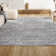 Tapis gris clair / crème
