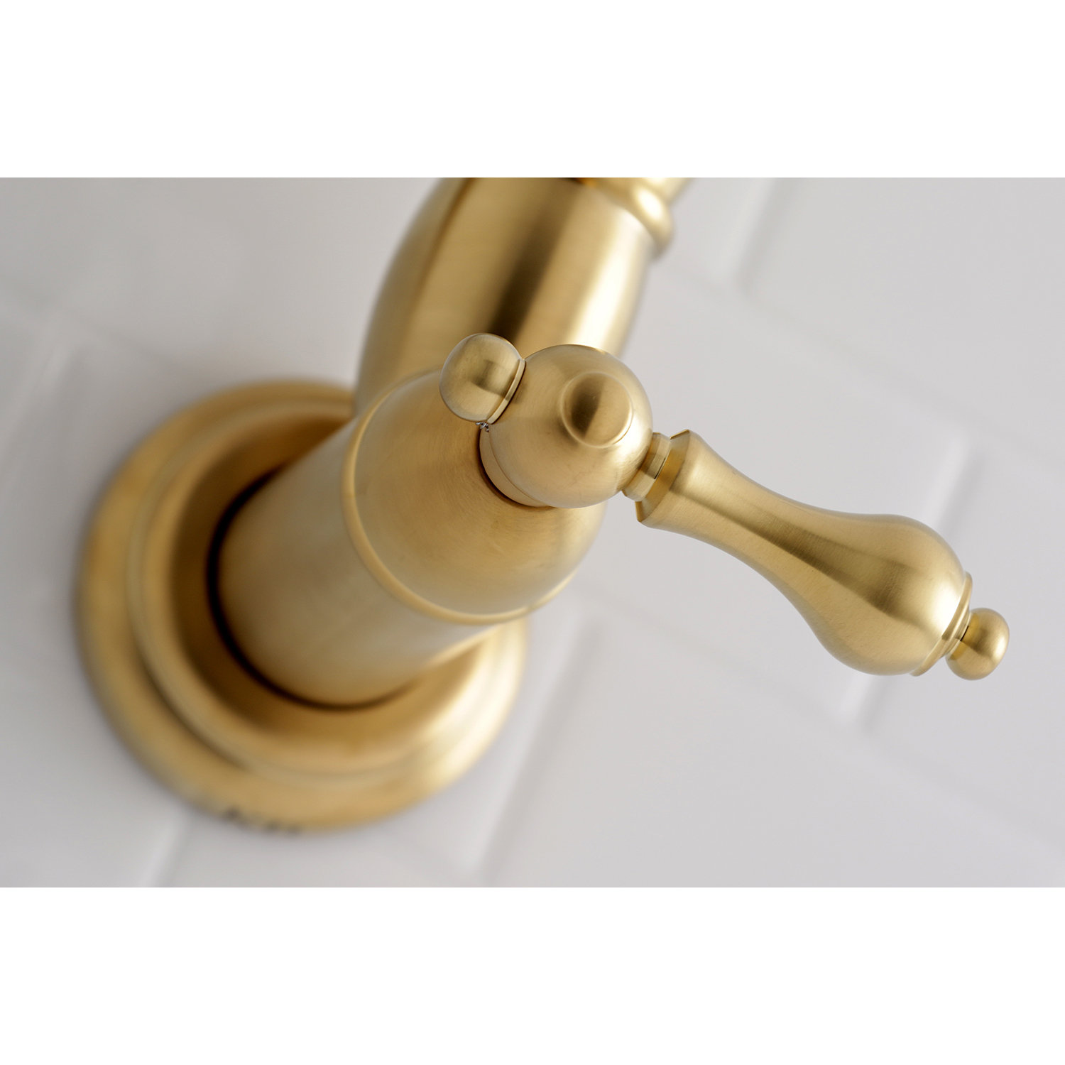 Kingston Brass Restoration Two-Handle 1-Hole Wall Mount Pot Filler Faucet, Brushed Brass