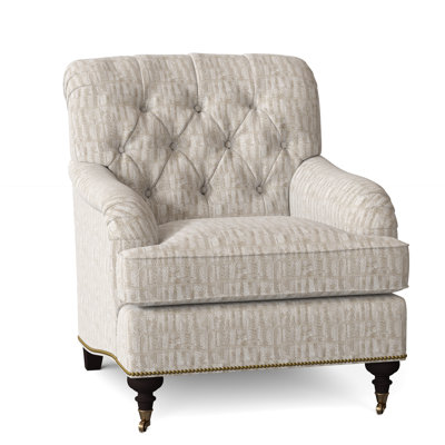 Fauteuil à coussin en duvet capitonné Devan