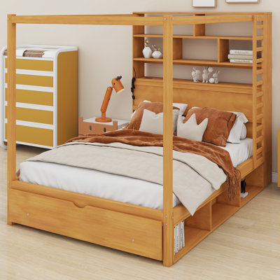 Structure de lit à baldaquin avec tête de lit bibliothèque, ports USB et lumières DEL pour ancrer une chambre à coucher moderne
