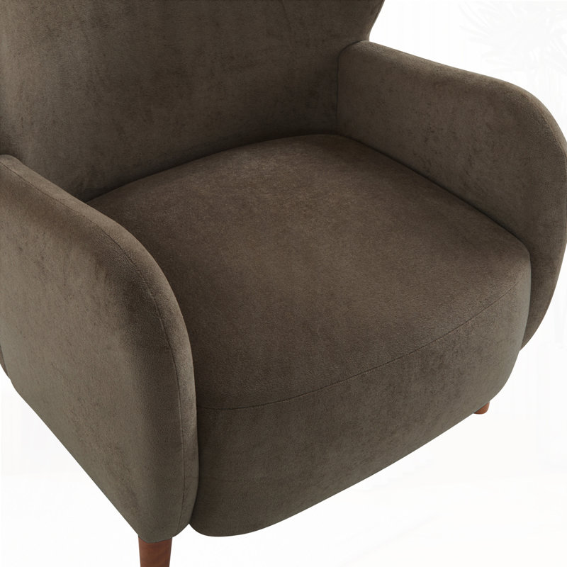 Fauteuil club à oreilles en velours