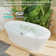 63" Solid Surface Stone Resin Oval-shaped Freestanding Soaking Bathtub With Overflow