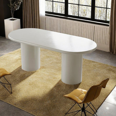 Table de salle à manger ovale de style crème avec pieds en acier