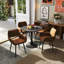 Ensemble de réception moderne 5 pièces avec table ronde noire et fauteuils rembourrés bruns