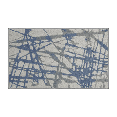 Tapis gris soyeux et moelleux