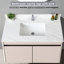 Dessus de meuble-lavabo blanc 43 po - Pierre frittée avec dosseret de 4 po, lavabo rectangulaire, trou de robinet pré-percé, option centrale, 4 po hygiénique