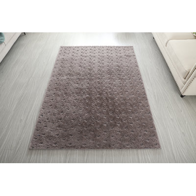 Tapis gris abstrait à poils longs