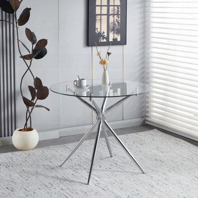 Table de salle à manger avec pieds en métal chromé et verre trempé - moderne