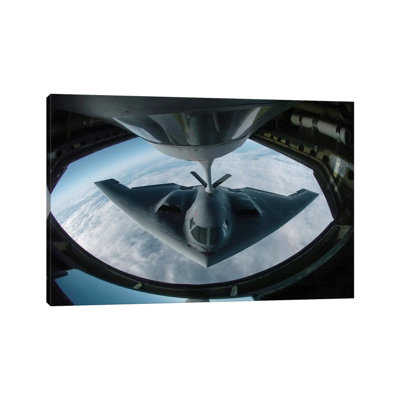 A B-2 Spirit Bomber Refuels from a KC-135 Stratotanker 1 Piece Wrapped Canvas Wall Art
