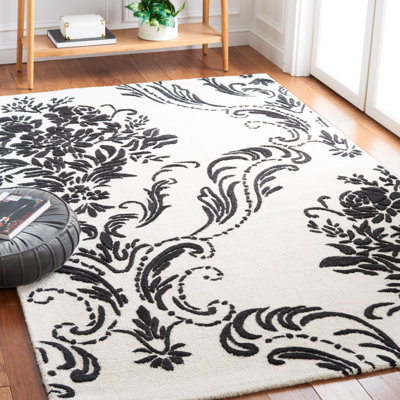 Tapis floral beige / ivoire en laine / coton touffeté à la main Esjay