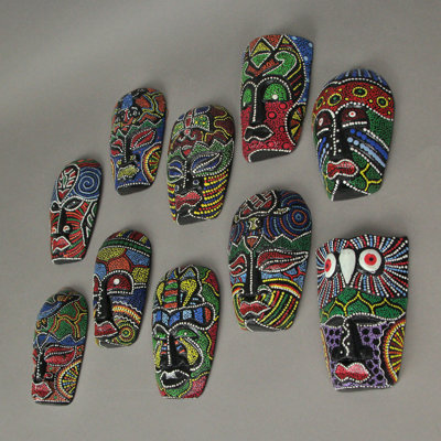Tropical set of 10 hand-carved Albesia wood tribal wall masks, dark brown dot-painted multicolor — 5" H x 3" W x 1.25" D