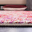 Tapis rouge à motif abstrait Riebe-295018086