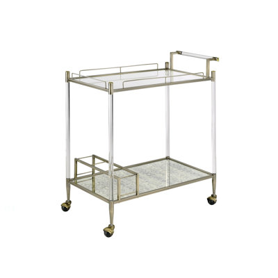Miroir antique et chariot de service en laiton