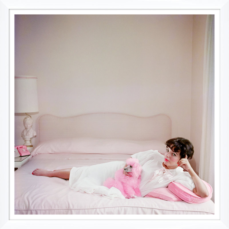 Joan Collins Relaxes Print by Slim Aarons, 36" H x 36" W x 1.5" D, White Single Picture Framed