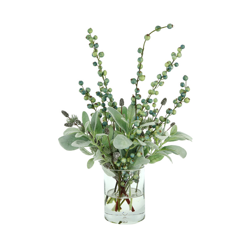 Arrangement floral mélangé dans un vase
