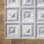 Tapis gris / blanc en polypropylène à motif géométrique Gerlyn-2104766591