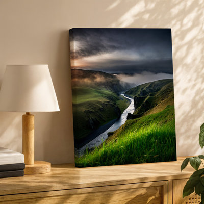 Canvas A Breathtaking View Of A Lush Green Valley With Vibrant Wall Art Grass In The Foreground Contrasting Against The Misty Backdrop Canvas Wall Art