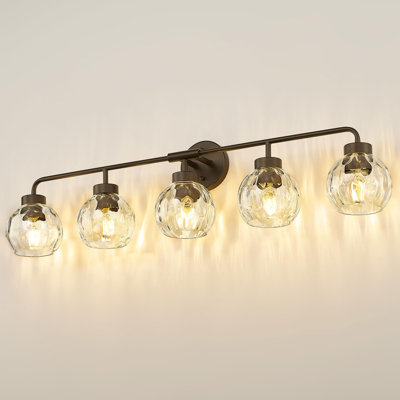 Éclairage pour salle de bain 5 lumières avec globe en verre ondulé, bronze huilé