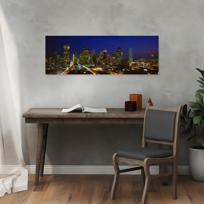 Buildings In A City Lit Up At Night Dallas Texas USA by Blakeway Worldwide - Wrapped Canvas Panoramic Print