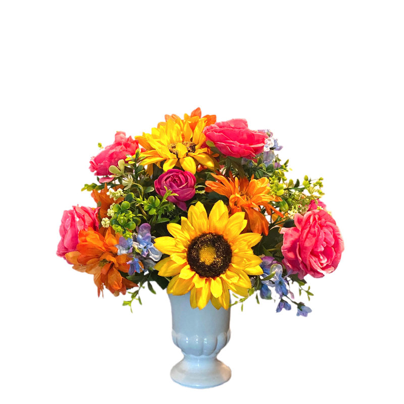 Arrangement floral mélangé dans un vase