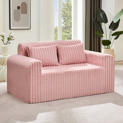 Canapé 2 places en mousse de 137 cm de large avec coussins décoratifs, canapé rembourré confortable et compact pour petits espaces, idéal pour un salon d'appartement.
