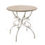 Table ronde en bois avec pieds à volutes en métal, blanc