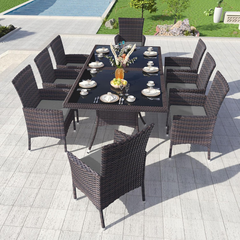 Hemraj 10-Piece Outdoor Dining Set Rattan Chairs With Cushions And Matching Glass-Top Tables, Gray