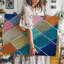 Toile un motif de textile vibrant avec un arrangement en diagonale d'art mural coloré avec des formes de losanges remplies d'une teinte différente-1456222881